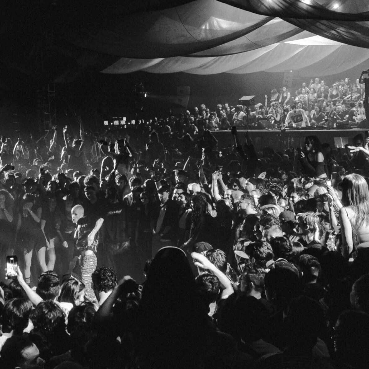 Ian Hotko performing in front of a packed crowd